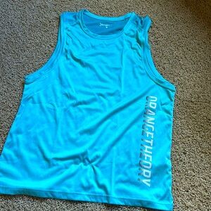 OTF MEN’s tank top. Aqua blue in color. Size L